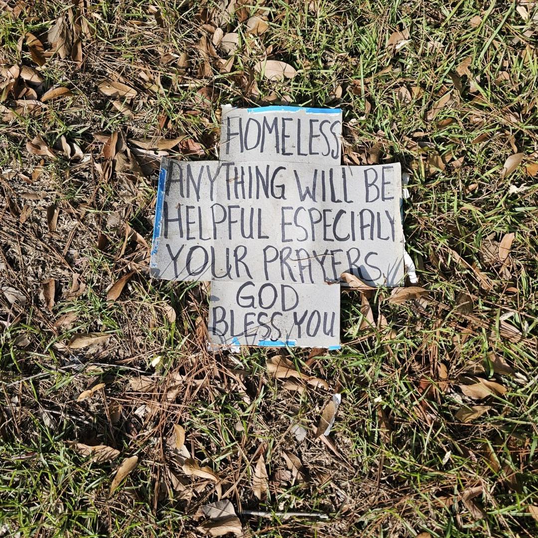 Homeless sign that says 'homeless anything will be helpful especially your prayers God bless you'
