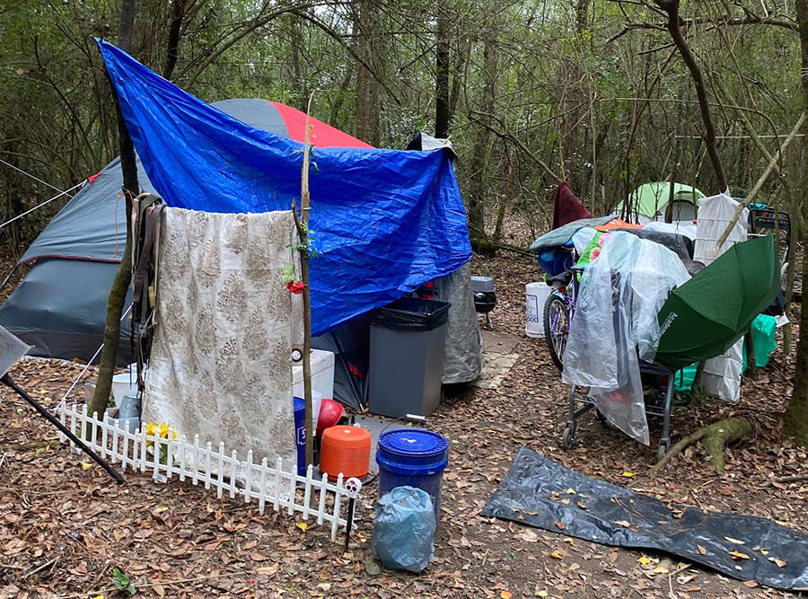 homeless tents in the woods